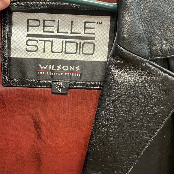 Black leather jacket with buttons and pockets - Picture 2 of 3